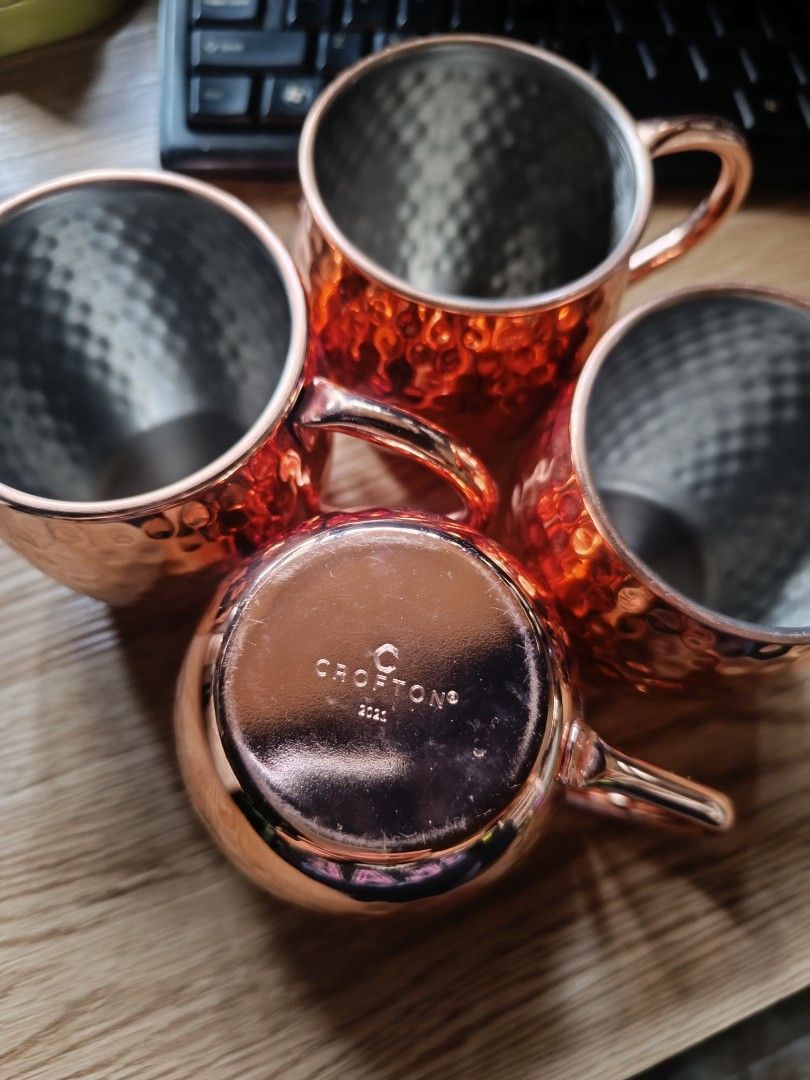 Crofton Copper Mugs (Category: Coffee & Tea Tableware) located in Manila. Submitted by wheng08 (Listing ID 1397242285, Image 1). Description: - Set of copper mugs - Hammered finish exterior - Brand: Crofton (visible on one mug) - Features a handle new from box set of 4.