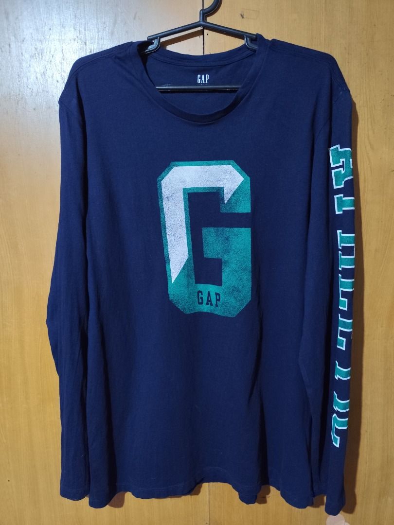 GAP Long Sleeve Shirt (Category: Tshirts & Polo Shirts ) located in Mandaluyong City. Submitted by msdeclutterfinds (Listing ID 1397249617, Image 2). Description: Gap men's graphic long-sleeve t-shirt in navy blue. large on tag GAP bought from Japan.