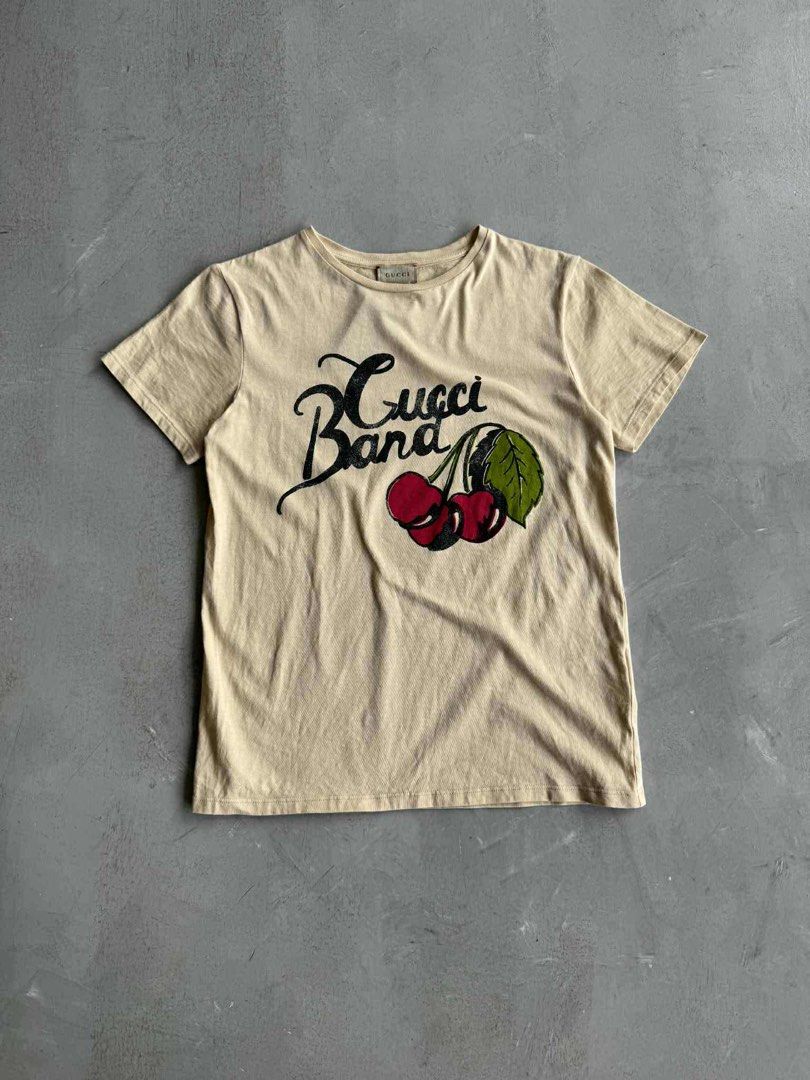 Gucci Cherry Graphic Cotton T- Shirt (Category: Shirts) located in Manila. Submitted by beyondarchives (Listing ID 1397274360, Image 1). Description: Sizew: 12 Width: 17 Length: 23 Materials: Cotton Condition: 9/10 Issue: None.