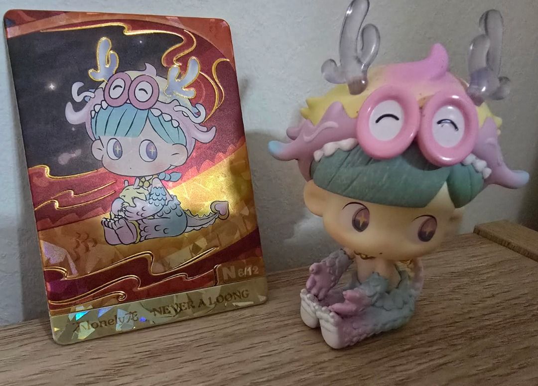Dimoo (Category: Designer & Blind Box Toys) located in Singapore. Submitted by dskwrld (Listing ID 1397330113, Image 2). Description: - Two Dimoo figures for sale - Each figure comes with its original card. Hirono is the rare color of the set - Kept in a display case. - Ideal for collectors. Dimoo- 8 sgd .