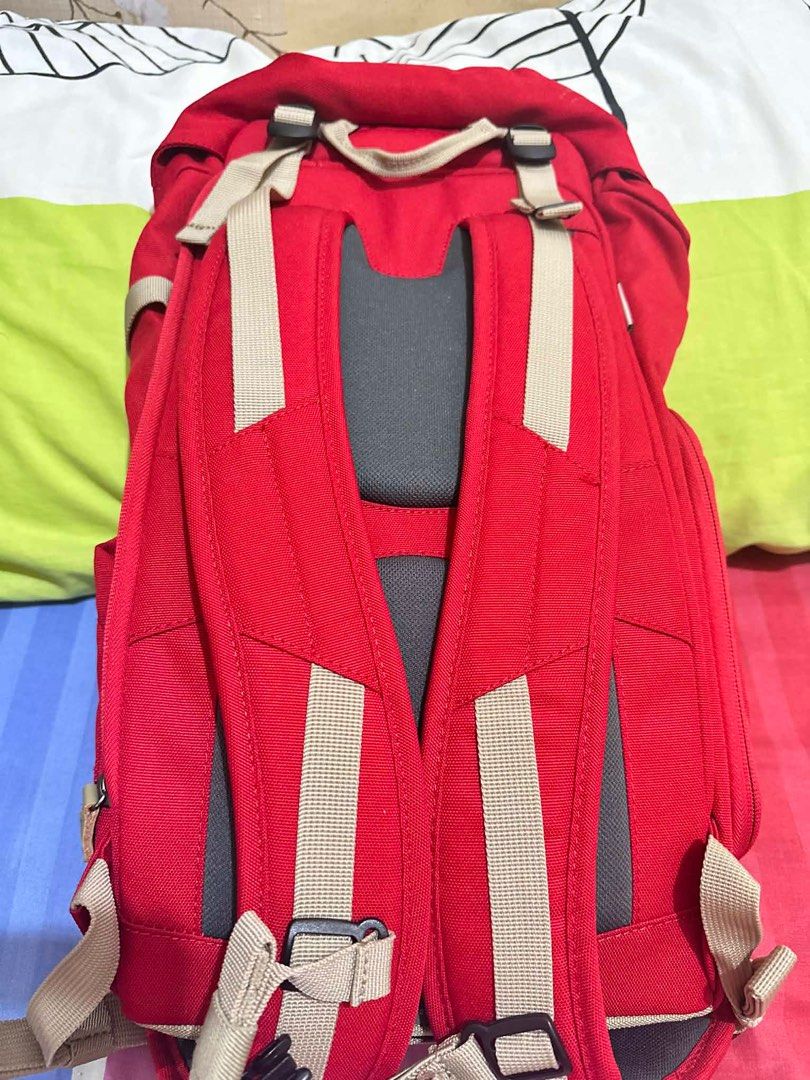 Lowepro Photo Backpack (Category: Backpacks) located in Quezon City. Submitted by marcelm.921 (Listing ID 1397282980, Image 2). Description: - Lowepro camera backpack - Color: Red and beige - Adjustable straps - Top flap closure - Padded back support for comfort - Includes tag with usage illustrations - Designed for camera equipment.