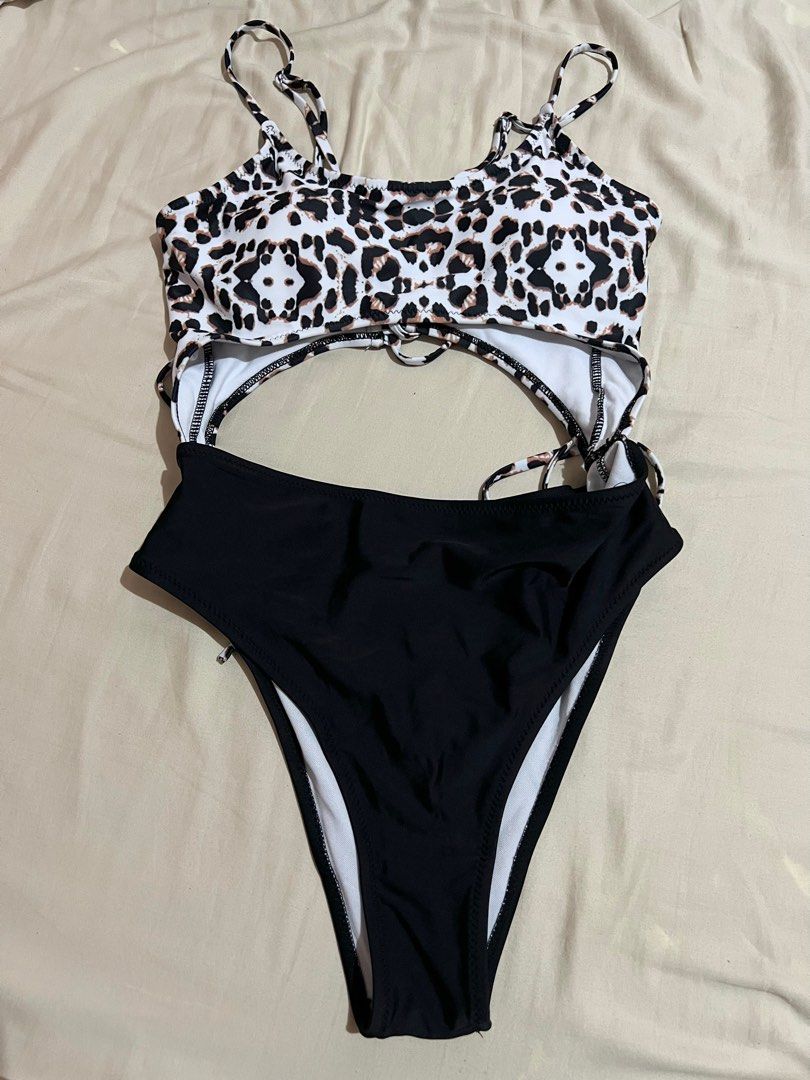 Meyeeka Cut out Front Cheeky Cut one piece (Category: Bikinis & Swimsuits) located in Nueva Valencia. Submitted by lululeimon (Listing ID 1397385931, Image 2). Description: Has white spots on bottom .