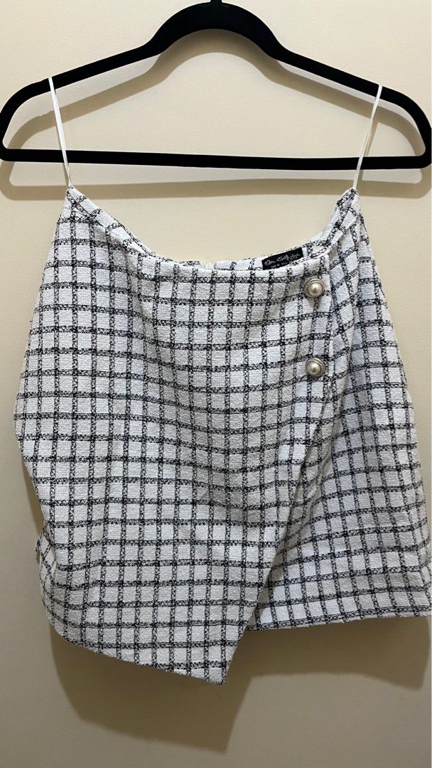 Miss Selfridge Tweed Skirt (Category: Skirts) located in Manila. Submitted by longbondpaper (Listing ID 1397288818, Image 1). Description: - Miss Selfridge skirt - White and black checkered pattern - Wrap design - Decorative pearl buttons - Made in Bulgaria - Size: EUR 36, US 6, UK 10 - Minor imperfection on the front (see 4th pic) - Chic and trendy.