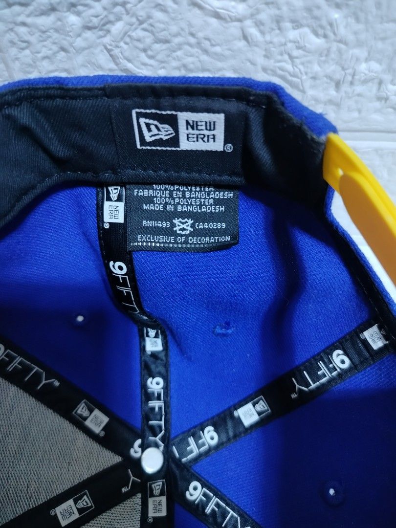 New Era Golden State Warriors Finals Cap (Category: Caps & Hats) located in Malvar. Submitted by caps_l0ck (Listing ID 1397310074, Image 3). Description: - Official New Era 9Fifty cap - Golden State Warriors design - Features a blue crown and yellow brim - Commemorates the 2017 NBA Finals - One size fits most - Includes New Era size tag.