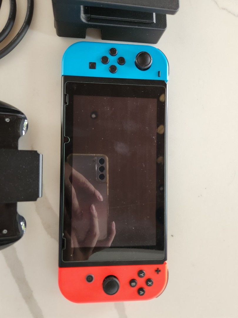 Nintendo switch decluttering sale (Category: Nintendo) located in San Juan City. Submitted by dailydealsphest2010 (Listing ID 1397236197, Image 3). Description: nintendo switch 32gb all complete with orig box with cables no damage no defects with tempered glass since day 1 .