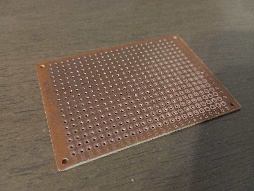 PCB Prototype Board (Category: Computer Parts) located in Petaling Jaya. Submitted by shakir_salam (Listing ID 1397335030, Image 1). Description: - Prototype PCB board - Pre-drilled holes for easy component placement - Numbered holes for organized soldering - Suitable for various electronic projects - Brown material - Rectangular shape with rounded corners - Includes mounting holes.