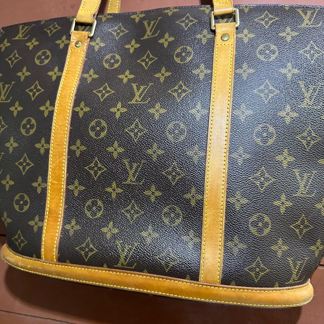 Preloved Louis Vuitton Babylone Monogram Tote Bag (Category: Luxury Bags & Wallets) located in Quezon City. Submitted by andeeclutters (Listing ID 1397345180, Image 2). Description: Preloved Louis Vuitton Babylone Monogram Tote Bag MOP: Gcash, Maya, BPI QR MOD: Lalamove/Grab, J&T/LBC.