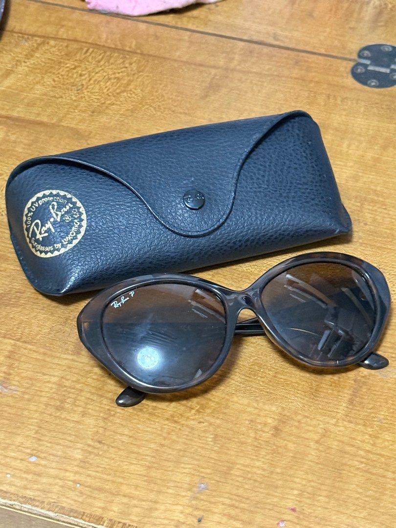 Ray-Ban Sunglasses with Case (Category: Sunglasses & Eyewear) located in Quezon City. Submitted by beabeys (Listing ID 1397331460, Image 1). Description: - original Ray-Ban sunglasses - Includes matching case - Dark lenses - Classic frame design - Suitable for everyday wear - Complements any outfit.