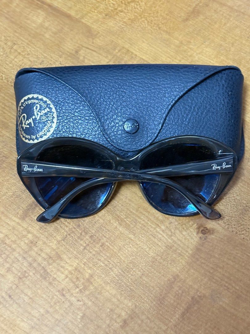 Ray-Ban Sunglasses with Case (Category: Sunglasses & Eyewear) located in Quezon City. Submitted by beabeys (Listing ID 1397331460, Image 2). Description: - original Ray-Ban sunglasses - Includes matching case - Dark lenses - Classic frame design - Suitable for everyday wear - Complements any outfit.