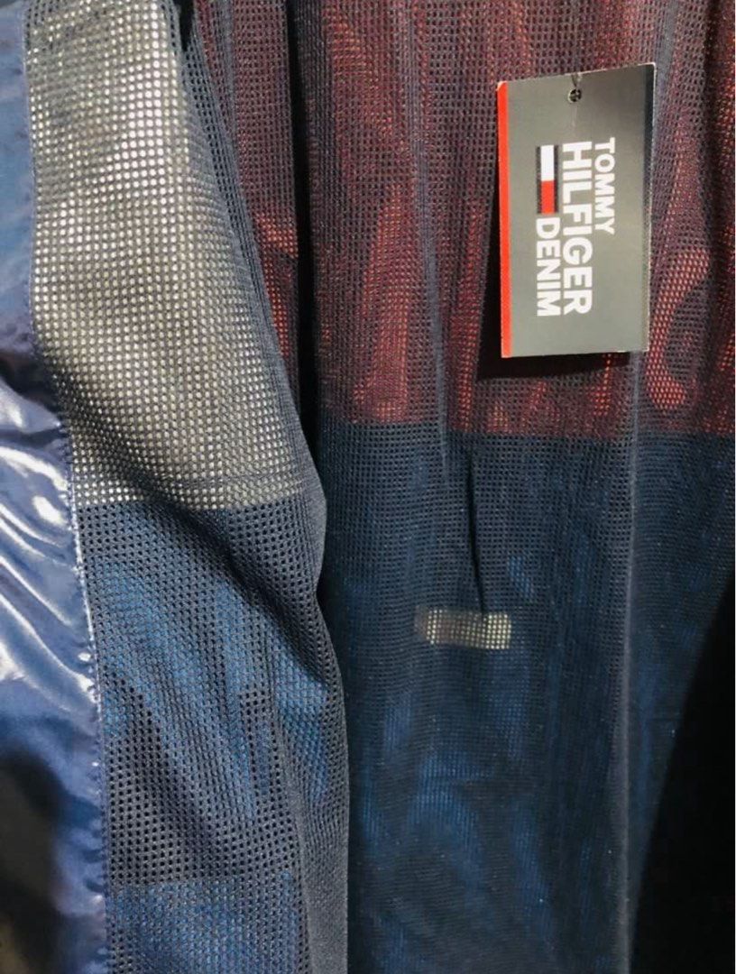 TH WINDBREAKER (Category: Coats, Jackets and Outerwear) located in Taytay. Submitted by rinimaha (Listing ID 1397390201, Image 3). Description: Authentic TH windbreaker / jacket Bought from USA Brandnew $129.99 on tag Dimension : 31 x 25 “.
