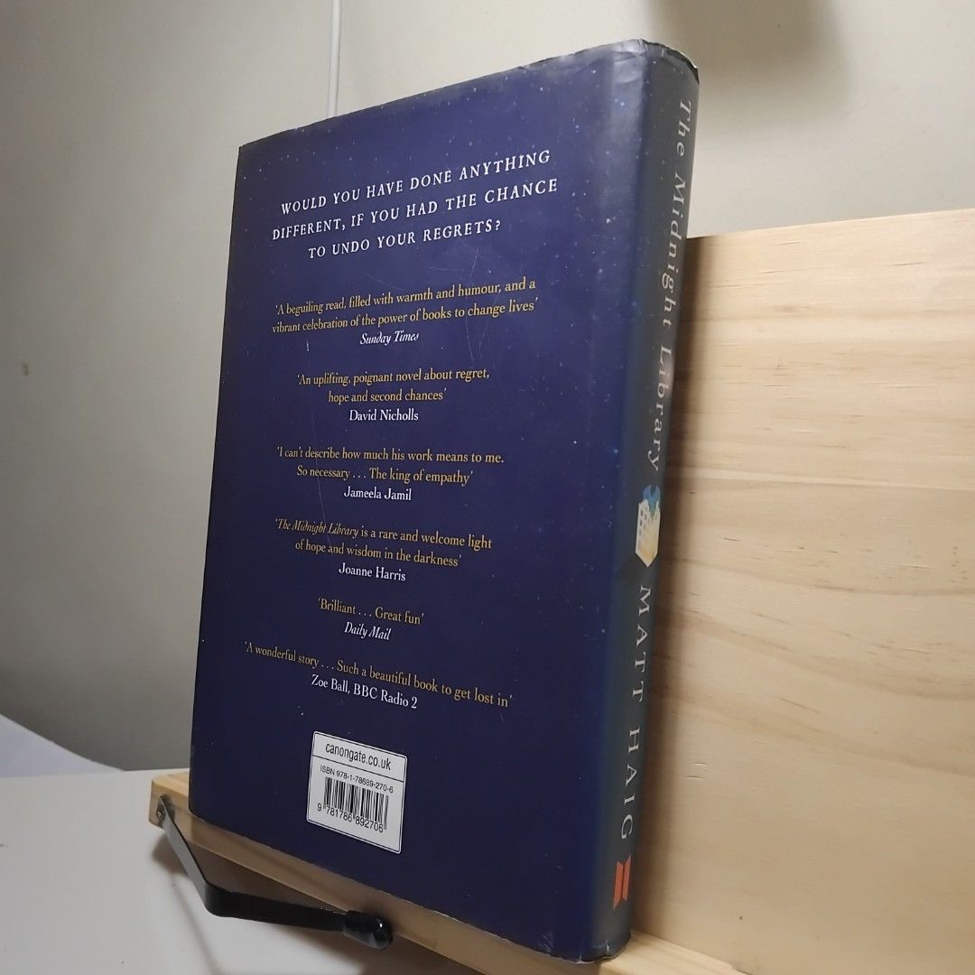 The Midnight Library (Hardbound) by Matt Haig (Category: Storybooks) located in Pasig City. Submitted by berto36 (Listing ID 1397277608, Image 3). Description: - "The Midnight Library" by Matt Haig. - Fiction genre. - Pre-loved condition. - Features a unique cover design. - Ideal for readers interested in exploring themes of regret and second chances. - A captivating read filled with warmth and humor..