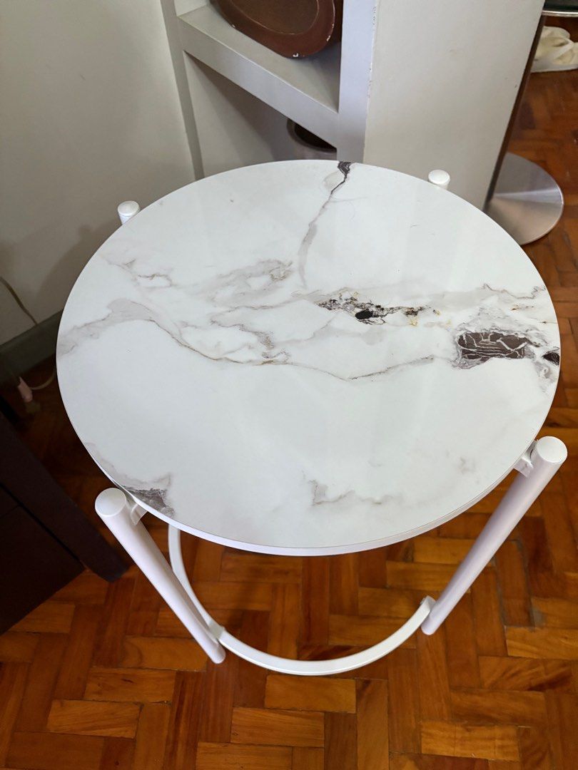 White Marble Top formica Side Table (Category: Tables & Sets) located in Manila. Submitted by jahbey (Listing ID 1397288821, Image 3). Description: - White marble-look tabletop - Round shape - White metal frame with curved legs - Ideal for small spaces - Perfect for drinks, books, or decor - Adds elegance 17in diameter x 23in H.