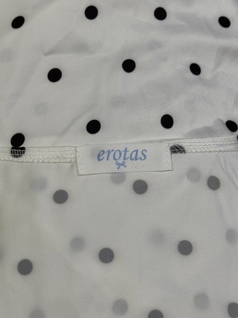 White Polka Dots Short Sleeve V-Neck (Category: Blouses) located in Binan City. Submitted by reinesells (Listing ID 1394742388, Image 2). Description: color: white with black polka dots size: small, 1m40-1m55, 38-50KG material: silk worn once.