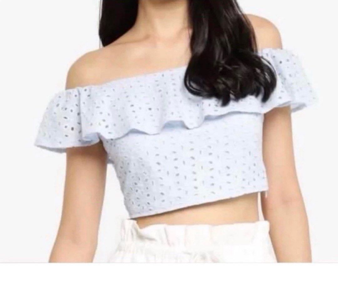 Zalora Basics Off Shoulder Eyelet Crop Top (Category: Others Tops) located in Imus. Submitted by mickey_faye (Listing ID 1397325376, Image 2). Description: - Zalora Basics off-shoulder crop top - Size: L - Features: Eyelet design, ruffled neckline - Closure: Zipper - Original Price: PHP 729.00 - Versatile for casual or dressy wear - Brandnew, bought from zalora. Dimes: Width: 18 inches Length: 11 inches Shipping fee will be shouldered by the buye