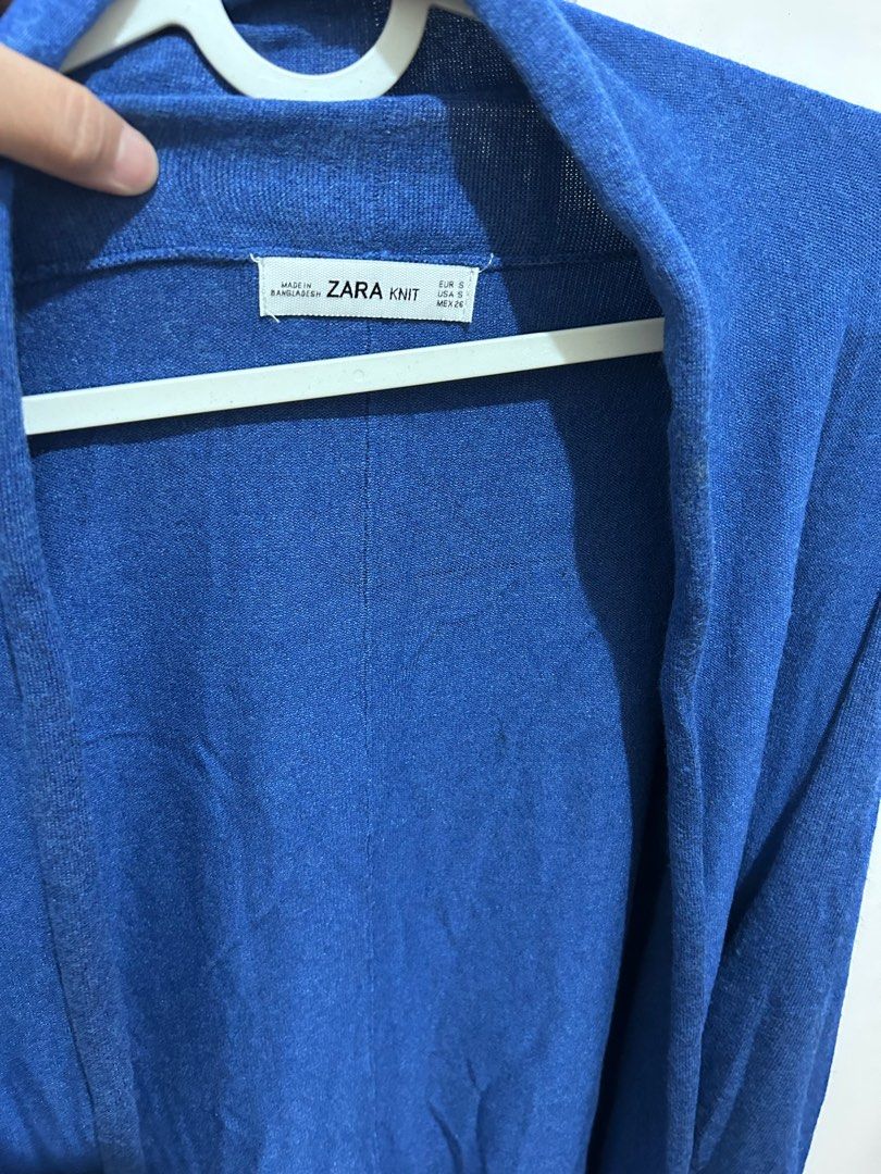 Zara Knit Cardigan - Blue (Category: Coats, Jackets and Outerwear) located in Manila. Submitted by primemover2 (Listing ID 1397321752, Image 2). Description: - Zara Knit Cardigan - Size: S - Open front design - Made in Bangladesh - Lightweight and comfortable - Adds a touch of color and style - Versatile for layering.
