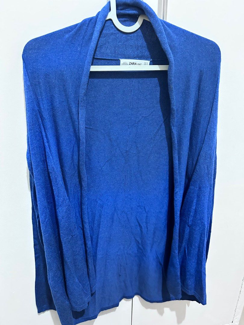 Zara Knit Cardigan - Blue (Category: Coats, Jackets and Outerwear) located in Manila. Submitted by primemover2 (Listing ID 1397321752, Image 1). Description: - Zara Knit Cardigan - Size: S - Open front design - Made in Bangladesh - Lightweight and comfortable - Adds a touch of color and style - Versatile for layering.