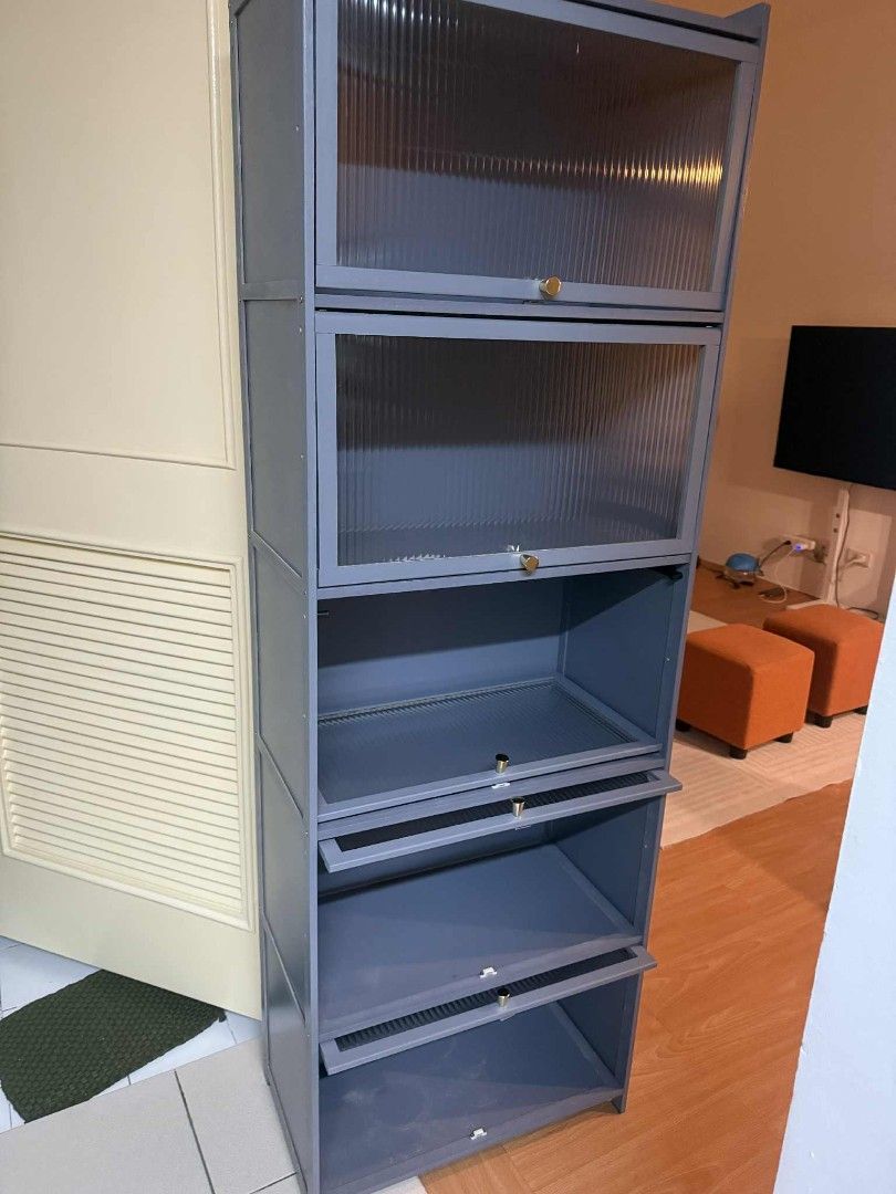 5-Layer Gray Kitchen Cabinet with Glass Doors (Category: Shelves, Cabinets & Racks) located in Pasig City. Submitted by block158 (Listing ID 1401581923, Image 1). Description: RUSH, gold as new. 5 Layers: L60/70/80*W42*H172cm Main material: Bamboo. Door panel material: Acrylic. Width: 42cm. • Paint process: Spray painting. •Functional features: Multi-layer, See-through, Removable. Door opening and closing method: Flip cover door..