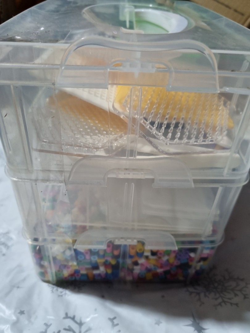 Beads Organizer with Beads and Accessories (Category: Craft Supplies & Tools) located in Paombong. Submitted by sweetdeals0181656 (Listing ID 1401645653, Image 2). Description: Clear plastic organizer with multiple compartments. Includes a variety of colorful beads, along with several accessories. Perfect for crafting and DIY projects. Great for storing and sorting beads and other small craft supplies..