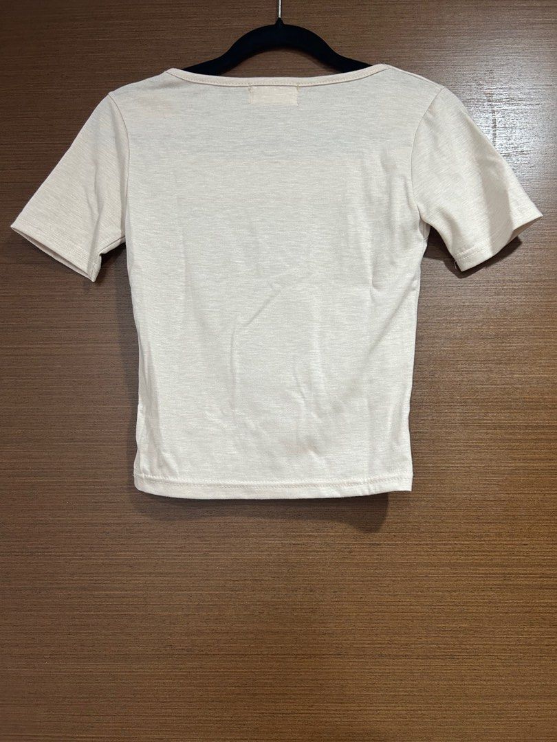 Beige Square Neck Top (Category: Shirts) located in Singapore. Submitted by h1ldaa (Listing ID 1401680708, Image 2). Description: Only worn once to try, still in good condition. Colour: Beige Size: free size Length: +/- 45cm Shoulder: +/- 33.5cm PTP: +/- 35cm Sleeve: +/- 18cm Meet up at my convenience. Mailing will be additional +$2.50 PM for more info.
