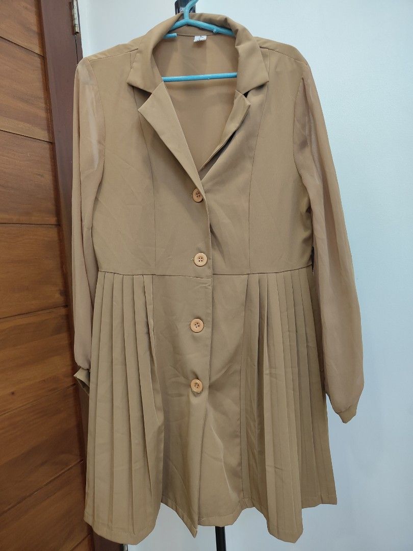 Brown Pleated Coat (Category: Coats, Jackets and Outerwear) located in Caloocan City. Submitted by cssasot (Listing ID 1401702252, Image 1). Description: - Brown pleated coat - Classic collar - Long sleeves - Button closure (4 buttons) - Lightweight material - Tailored fit with slight flare - Versatile for layering Can fit from XS to M Location: 8th Avenue Caloocan Can deliver anytime.