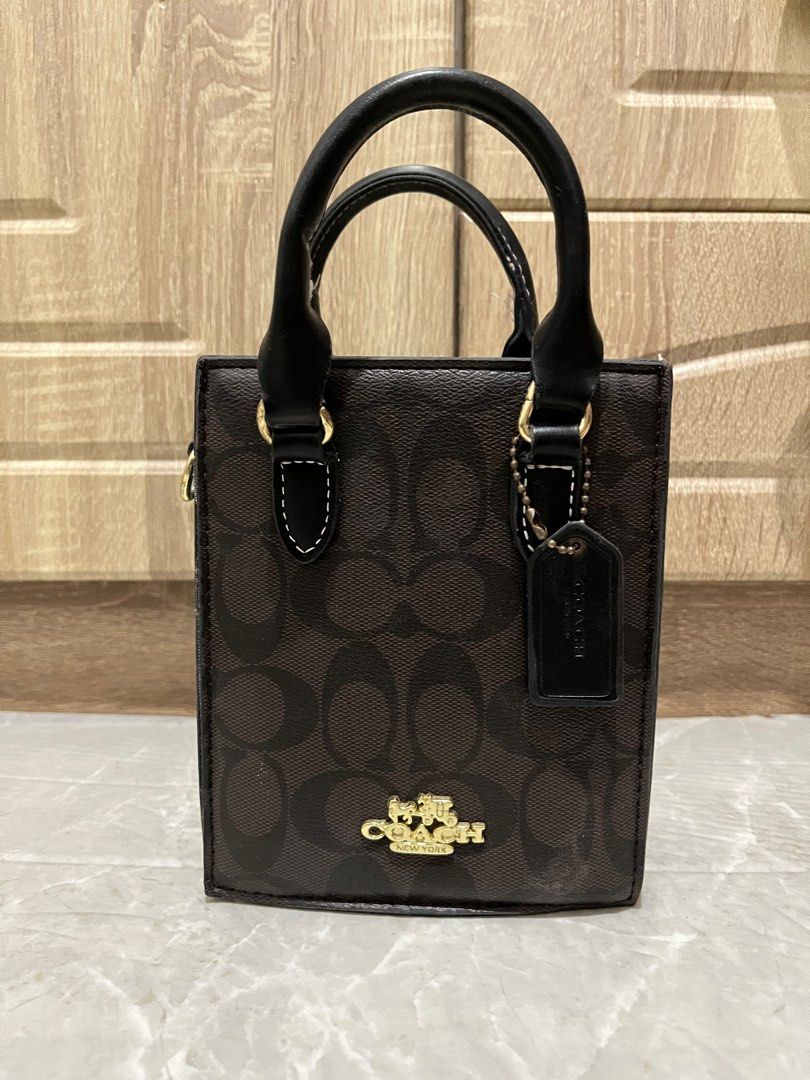 Coach Sling Mini Bag Hand Bag (Category: Luxury Bags & Wallets) located in Manila. Submitted by fiercecloud-8561 (Listing ID 1401593059, Image 3). Description: Coach Mini Sling Bag class A comes with dust bag, box and receipt Condition: slightly used, might have some signs of use such as creases and minor flaws. mop: gcash/bank transfer mod: j&t 📍nueva ecija.
