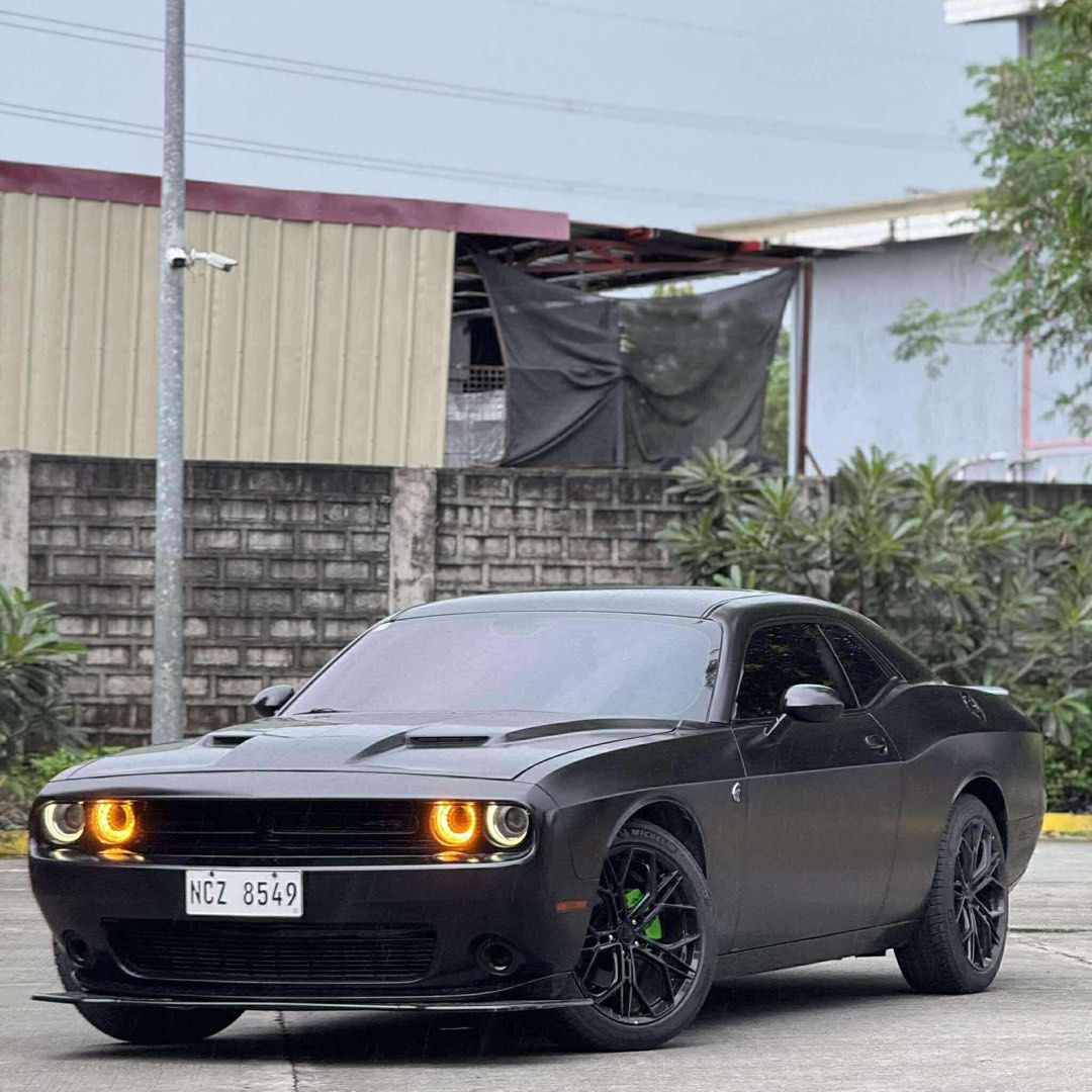 Dodge Challenger SXT Auto (Category: Used Cars) located in Manila. Submitted by quality_cars (Listing ID 1401575196, Image 3). Description: FORSALE ‼️ 2016 DODGE CHALLENGER SXT 3.6L V6 Gasoline Engine Automatic Transmission 27,000 Mileage 305 Horsepower @ 6350 rmp Full Exhaust System Michelin 245/45/20 Tires Ducktail Installed Fresh & Intact Interior Carbon Fiber Panels 1st Owner Acquired Registered until 2026 LTO & HPG Verified Complete Original