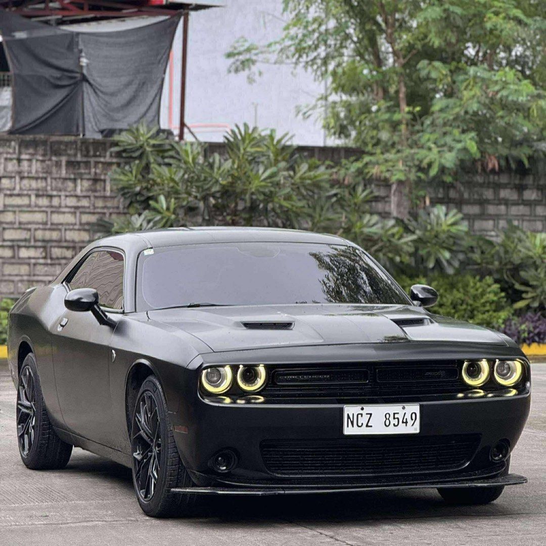 Dodge Challenger SXT Auto (Category: Used Cars) located in Manila. Submitted by quality_cars (Listing ID 1401575196, Image 2). Description: FORSALE ‼️ 2016 DODGE CHALLENGER SXT 3.6L V6 Gasoline Engine Automatic Transmission 27,000 Mileage 305 Horsepower @ 6350 rmp Full Exhaust System Michelin 245/45/20 Tires Ducktail Installed Fresh & Intact Interior Carbon Fiber Panels 1st Owner Acquired Registered until 2026 LTO & HPG Verified Complete Original