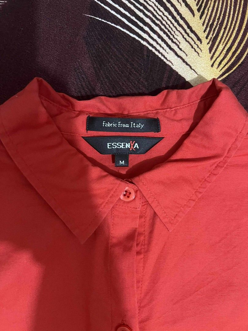Essenza Red Shirt - Size M (Category: Longsleeves) located in Bulacan. Submitted by Domozz (Listing ID 1401681905, Image 3). Description: - Red Essenza shirt - Size M - Made with Italian fabric - Classic button-down design - Long sleeves - Collared neckline - Tailored fit - Perfect for adding a pop of color.