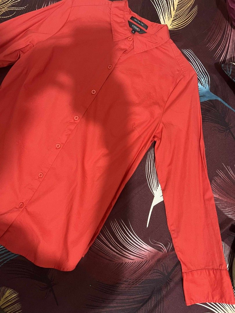 Essenza Red Shirt - Size M (Category: Longsleeves) located in Bulacan. Submitted by Domozz (Listing ID 1401681905, Image 2). Description: - Red Essenza shirt - Size M - Made with Italian fabric - Classic button-down design - Long sleeves - Collared neckline - Tailored fit - Perfect for adding a pop of color.