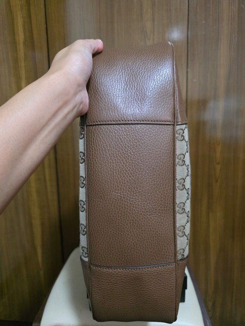 Gucci GG Canvas Shoulder Bag (Category: Luxury Bags & Wallets) located in Cainta. Submitted by annavm (Listing ID 1401545202, Image 3). Description: Personal owned Gucci Bree Canvas Hobo Lightly used with dustbag and care card you may request additional pictures.