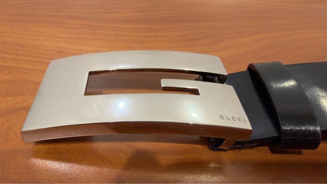 Gucci Silver G Buckle Black Leather Belt (Category: Luxury Accessories) located in Binangonan. Submitted by c_r_i_s (Listing ID 1401674701, Image 2). Description: Gucci Silver G Buckle Black Leather Belt Authenic Size 26 With light signs of use In very good condition! Made in Italy.