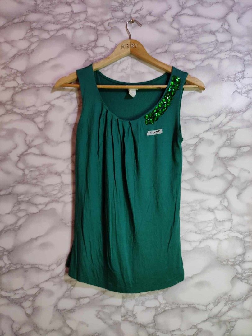 H&M Conscious Collection Green Tank Top (Category: Sleeveless) located in Bulacan. Submitted by 2nd_base (Listing ID 1401708500, Image 1). Description: dimension width 15 / length 25 size: small to medium excellent condition, no issue.