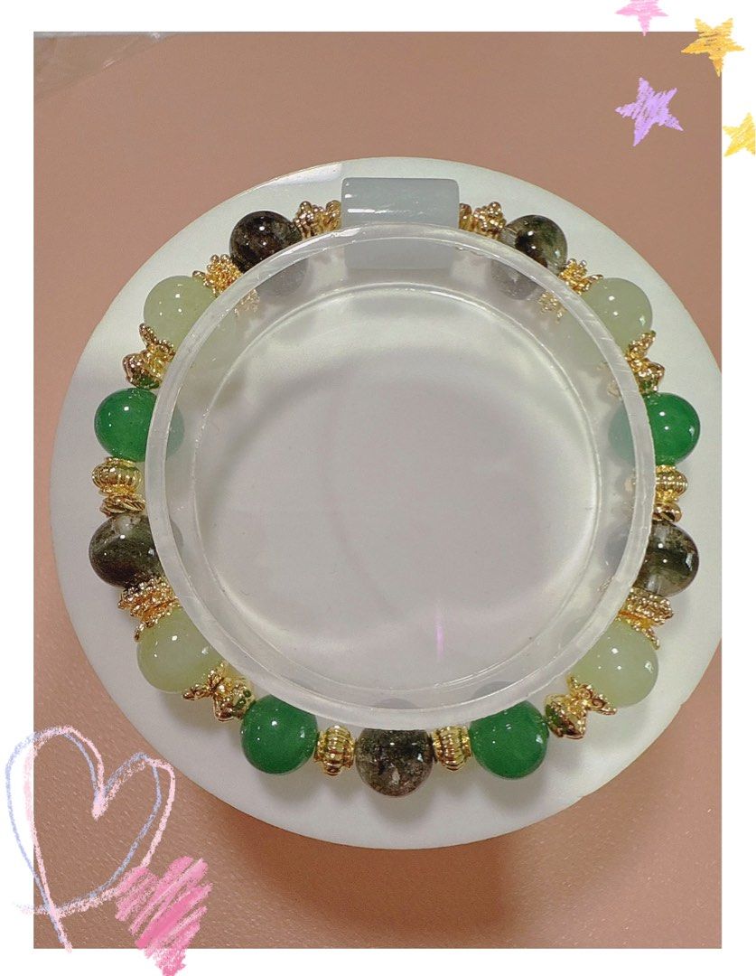 Jadite Bracelet (Category: Bracelets) located in Singapore. Submitted by blurrbit12 (Listing ID 1401627607, Image 1). Description: Got is as a gift. Letting go since not wearing. 16cm wrist size. Not sure of the grade of crystals. .