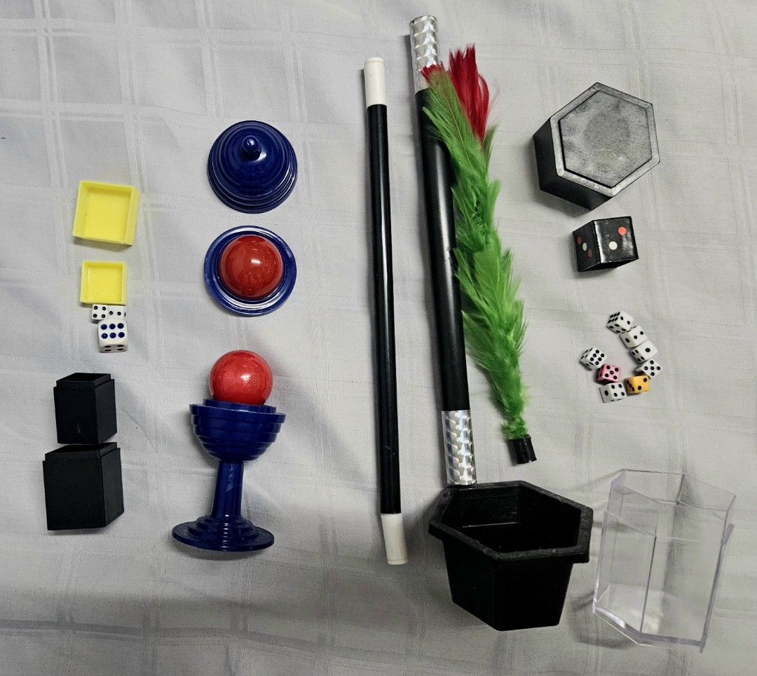 Magic Set (Category: Interactive Toys) located in Singapore. Submitted by randomriaev_ (Listing ID 1401677539, Image 1). Description: Magic set consists of props like wands,dice and etc..