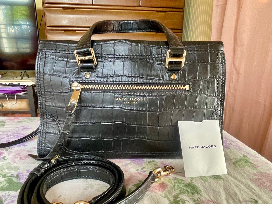 Marc Jacobs Cruiser (Large size) (Category: Luxury Bags & Wallets) located in Bulacan. Submitted by happylion-a983 (Listing ID 1401538745, Image 1). Description: Guaranteed authentic with tags and care card. Bought for 16k. Current selling price by online sellers is at 17k. Croc leather Large size No visible signs of usage. Used few times. Flawless gold hardware (can send more detailed pictures) Rubber linings are all intact Selling for 7.5k nego