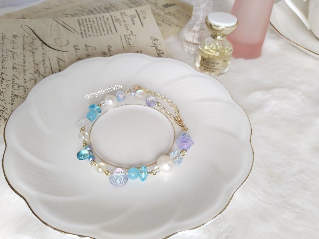 Night Siren Blue Bracelet (Category: Bracelets) located in Davao. Submitted by leonaaurie (Listing ID 1401611950, Image 3). Description: A bracelet inspired with mermaids with blue night sky, this piece has real freshwater pearls, glass beads and acrylic beads, in 14k bracelet..