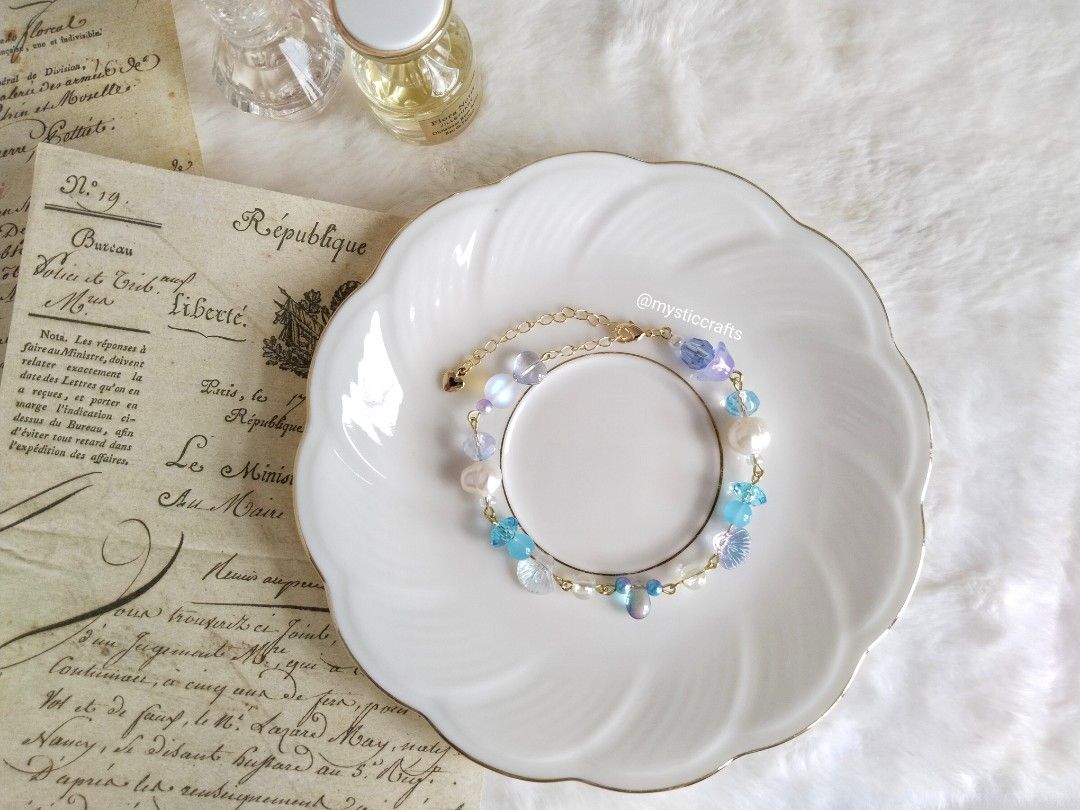 Night Siren Blue Bracelet (Category: Bracelets) located in Davao. Submitted by leonaaurie (Listing ID 1401611950, Image 1). Description: A bracelet inspired with mermaids with blue night sky, this piece has real freshwater pearls, glass beads and acrylic beads, in 14k bracelet..
