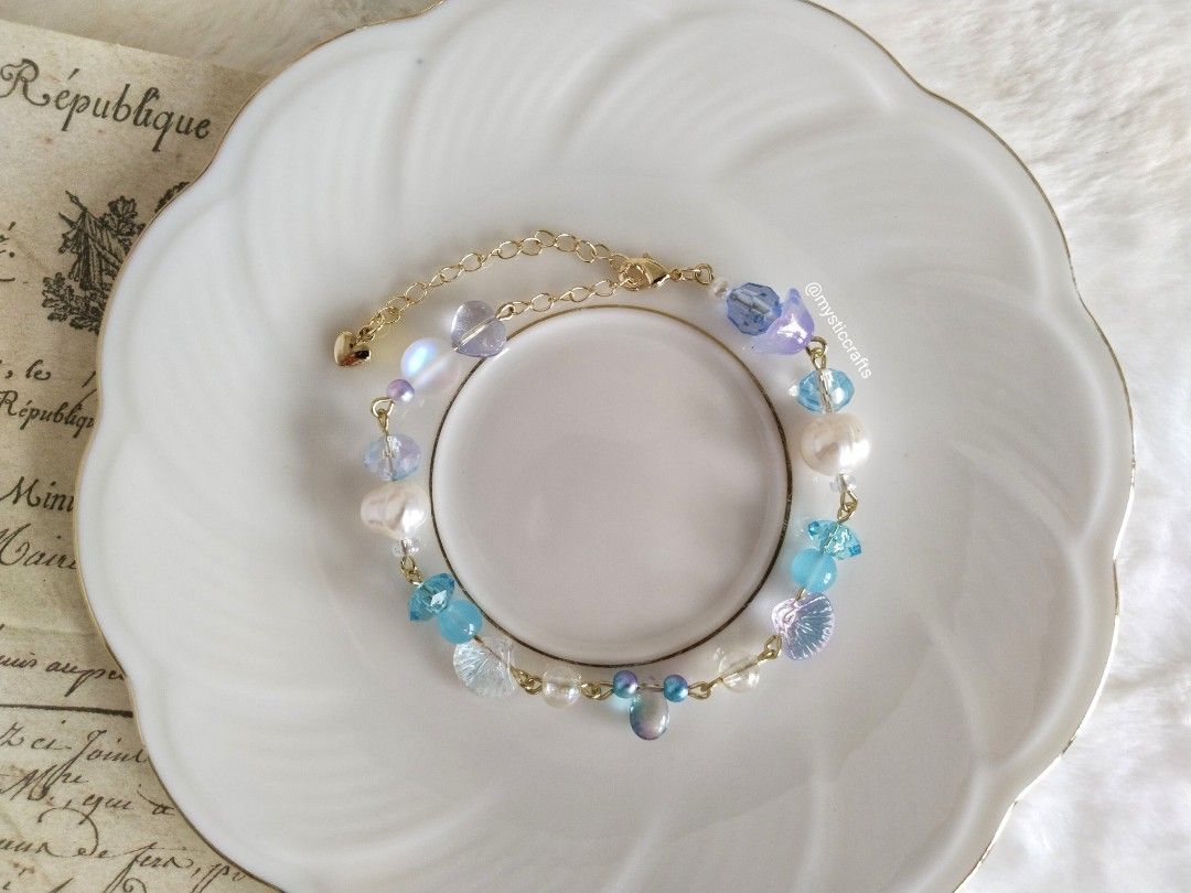 Night Siren Blue Bracelet (Category: Bracelets) located in Davao. Submitted by leonaaurie (Listing ID 1401611950, Image 2). Description: A bracelet inspired with mermaids with blue night sky, this piece has real freshwater pearls, glass beads and acrylic beads, in 14k bracelet..