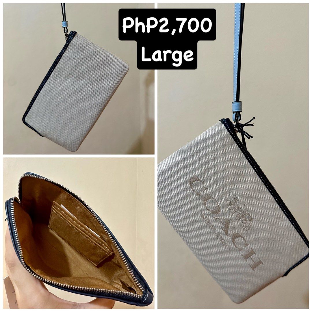 Original Coach Large Wristlet (Category: Luxury Bags & Wallets) located in Rizal. Submitted by TineStore (Listing ID 1401539274, Image 1). Description: - Available in two colors: - Beige canvas with black trim - Red leather with gold zipper - Features: - Wrist strap - Interior card slots - Price: PHP2,700.