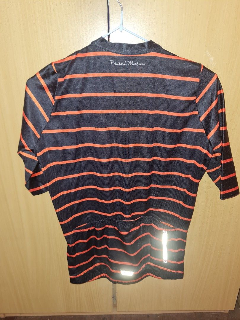 Pedal Mafia Jersey (Category: Activewear) located in Quezon City. Submitted by raymorph (Listing ID 1401596983, Image 2). Description: Black with Orange Stripes. Size XS. Feels like size small. Can pass as new. No issues. RFS. Too many jerseys Color may be subject to change under different lighting conditions..
