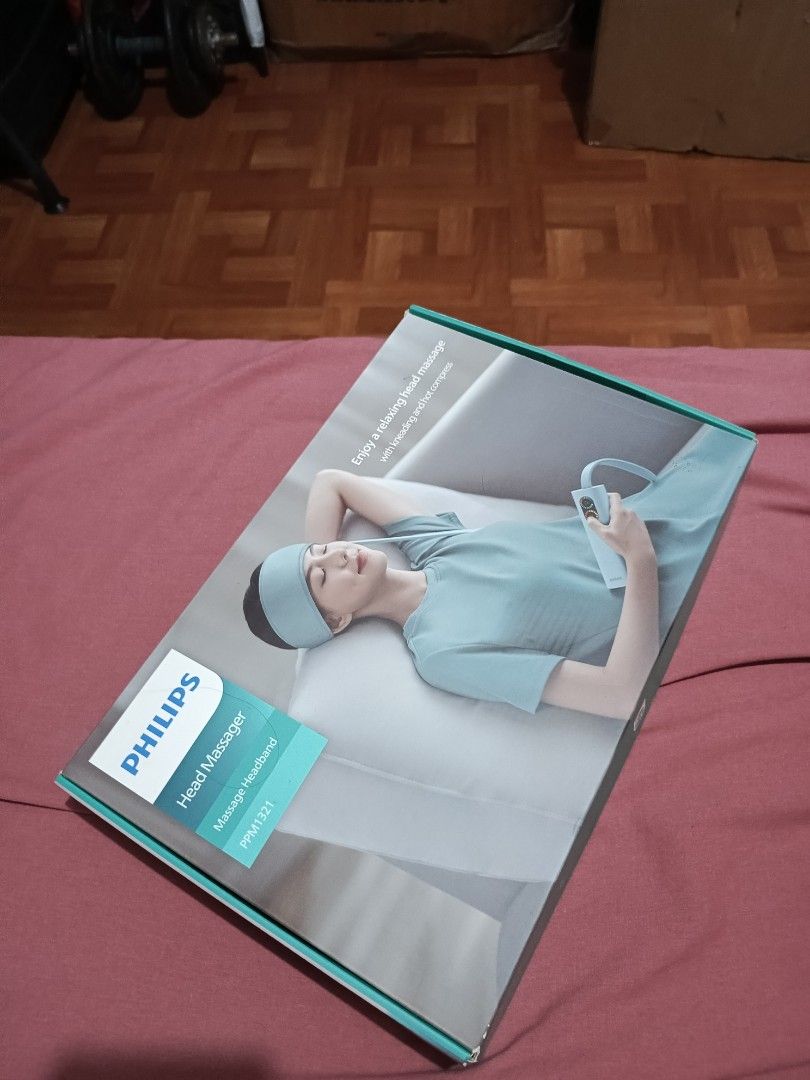 Philips Head Massager (Category: Massage Devices) located in Las Pinas. Submitted by kawatbear (Listing ID 1401652731, Image 1). Description: Enjoy a relaxing head massage with this Philips head massager. It comes with a head band, control unit, charging cable, and a carrying pouch. The box also includes the user manual. The massager is light blue in color. para SA palaging mainit Ang ulo chill ka dito 🤣 binuksan ko lang pero Hindi ginamit premy