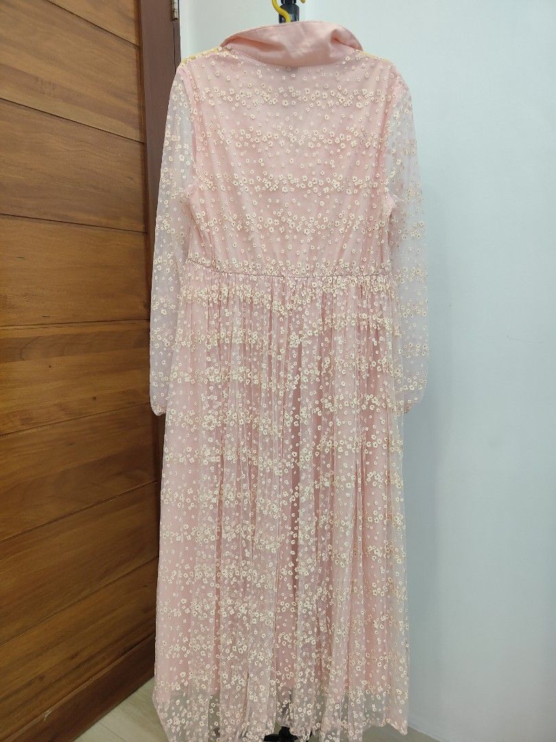 Pink Floral Maxi Dress (Category: Dresses) located in Caloocan City. Submitted by cssasot (Listing ID 1401701656, Image 2). Description: Elegant pink maxi dress with floral details. Features a collared neckline, long sleeves, fitted bodice, and flowing skirt. Perfect for special occasions. Can fit from XS to L Location: 8th Avenue Caloocan Can deliver anytime.