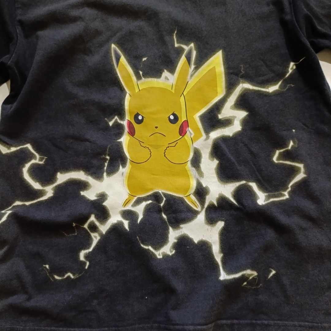 Pokemon Pikachu Lightning T-shirt (Category: Tshirts & Polo Shirts ) located in Minglanilla. Submitted by thriftdig (Listing ID 1401652997, Image 3). Description: - Pikachu t-shirt - Size: M 21X28.5 - Brand: LITLAB - Design: Pikachu with lightning graphics (front and back) - Features: Pokemon logo on sleeve - Style: Crew neck, short sleeves #pokemon #pokemonshirt #carousell #vintageshirt #vintage.