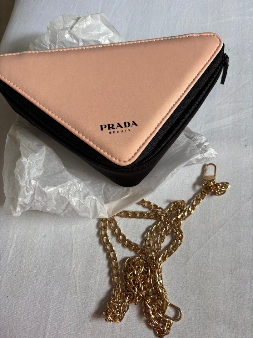 Prada Beauty Pink Triangle Pouch with Chain (Category: Luxury Bags & Wallets) located in Manila. Submitted by plussize530 (Listing ID 1401566367, Image 3). Description: .
