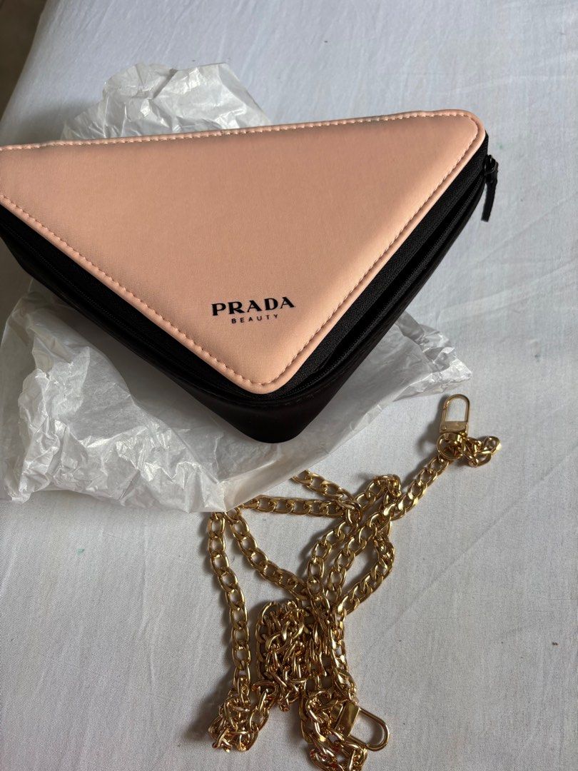 Prada Beauty Pink Triangle Pouch with Chain (Category: Luxury Bags & Wallets) located in Manila. Submitted by plussize530 (Listing ID 1401566367, Image 1). Description: .