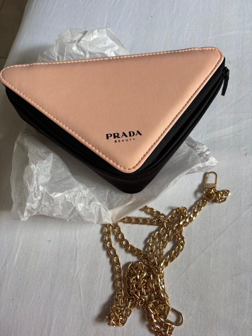 Prada Beauty Pink Triangle Pouch with Chain (Category: Luxury Bags & Wallets) located in Manila. Submitted by plussize530 (Listing ID 1401566367, Image 2). Description: .