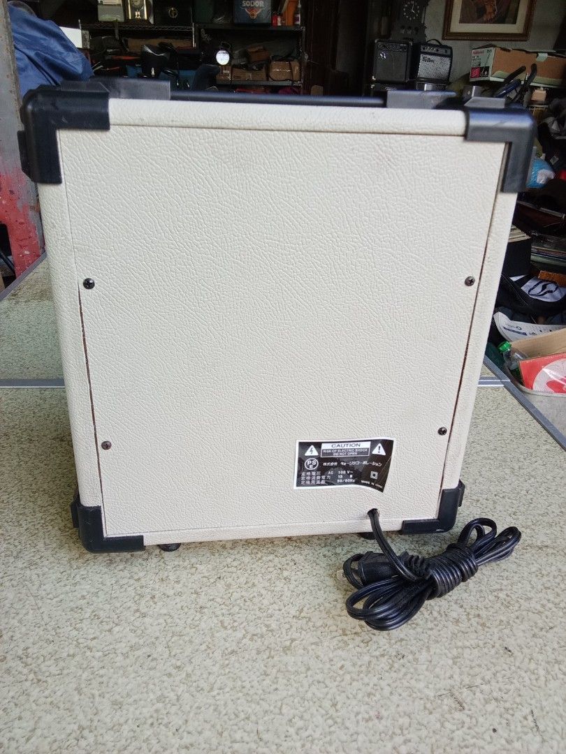 Selva Mighty Box MB-10G Practice Amplifier (Category: Soundbars, Speakers & Amplifiers) located in San Pedro. Submitted by trisheljas_japansurplus (Listing ID 1401683491, Image 3). Description: Selva Mighty Box MB-10G practice amplifier for electric guitars. Features input, gain, volume, bass, and treble controls. Includes aux in and headphone jacks. Power switch is located on the front panel. The back panel has a power cord and a sticker with sp