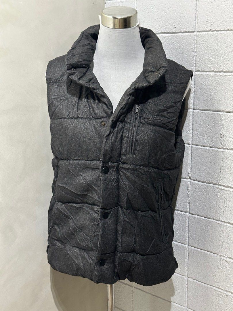 SPAO Padded Vest (Category: Vests) located in Tarlac. Submitted by wearagainboutique (Listing ID 1401656078, Image 3). Description: SALE SALE!!! Puffer Jackets/Vest * Any 2 For 1100 (price range of 600 and up) * Any 2 For 900 (price of 500) * Any 3 For 1000 (price range of 300 to 400) - SPAO padded vest - Dark grey color - Size: L - Quilted design - High collar - Zip closure - Button closure - Multiple pockets (some with zippers).