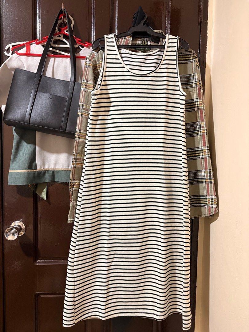 Striped Tank Dress (Category: Dresses) located in Manila. Submitted by orion_declutter (Listing ID 1401653221, Image 2). Description: - Striped midi dress - Sleeveless design - Round neckline - Made of knit fabric - Ideal for casual occasions.