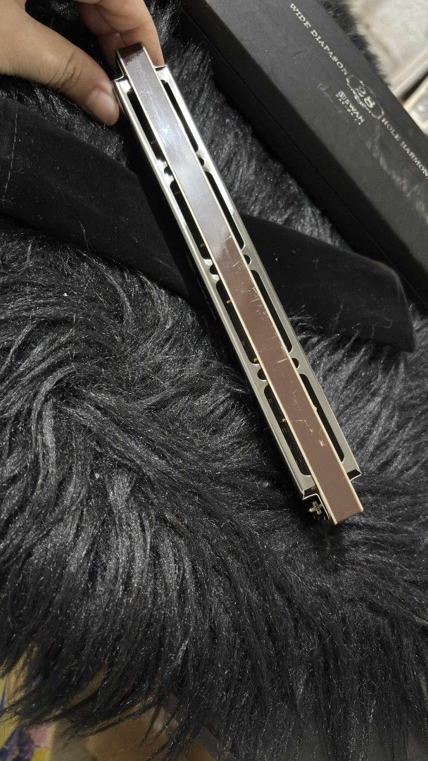 Swan Harmonica 28 holes (Category: Musical Instruments) located in Manila. Submitted by dallecloset_ii (Listing ID 1401553934, Image 3). Description: slightly used 28 holes.
